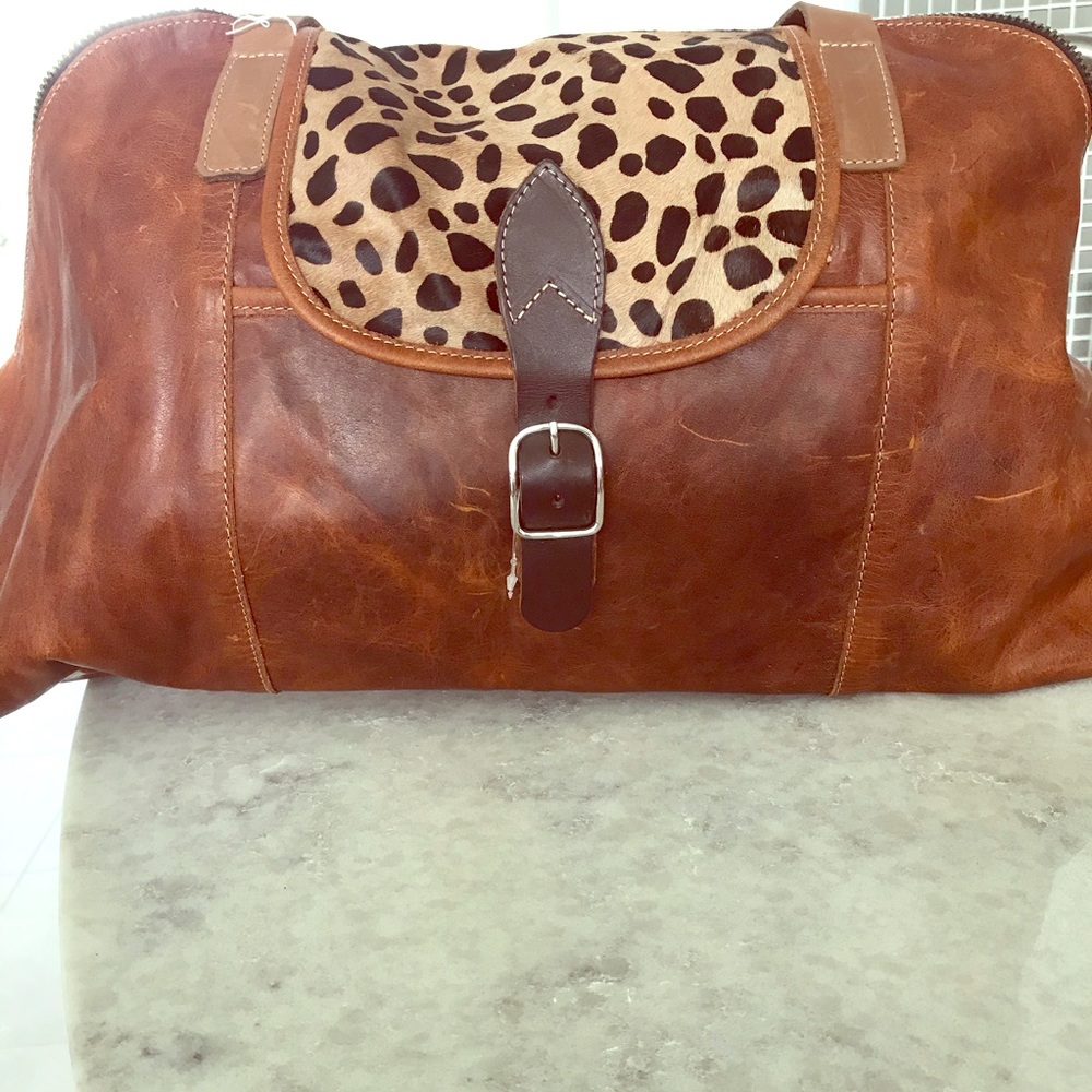 Duffel bag oh smell the leather
